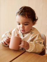 Merle Cape Bib Peach/Sea Shell | Liewood
