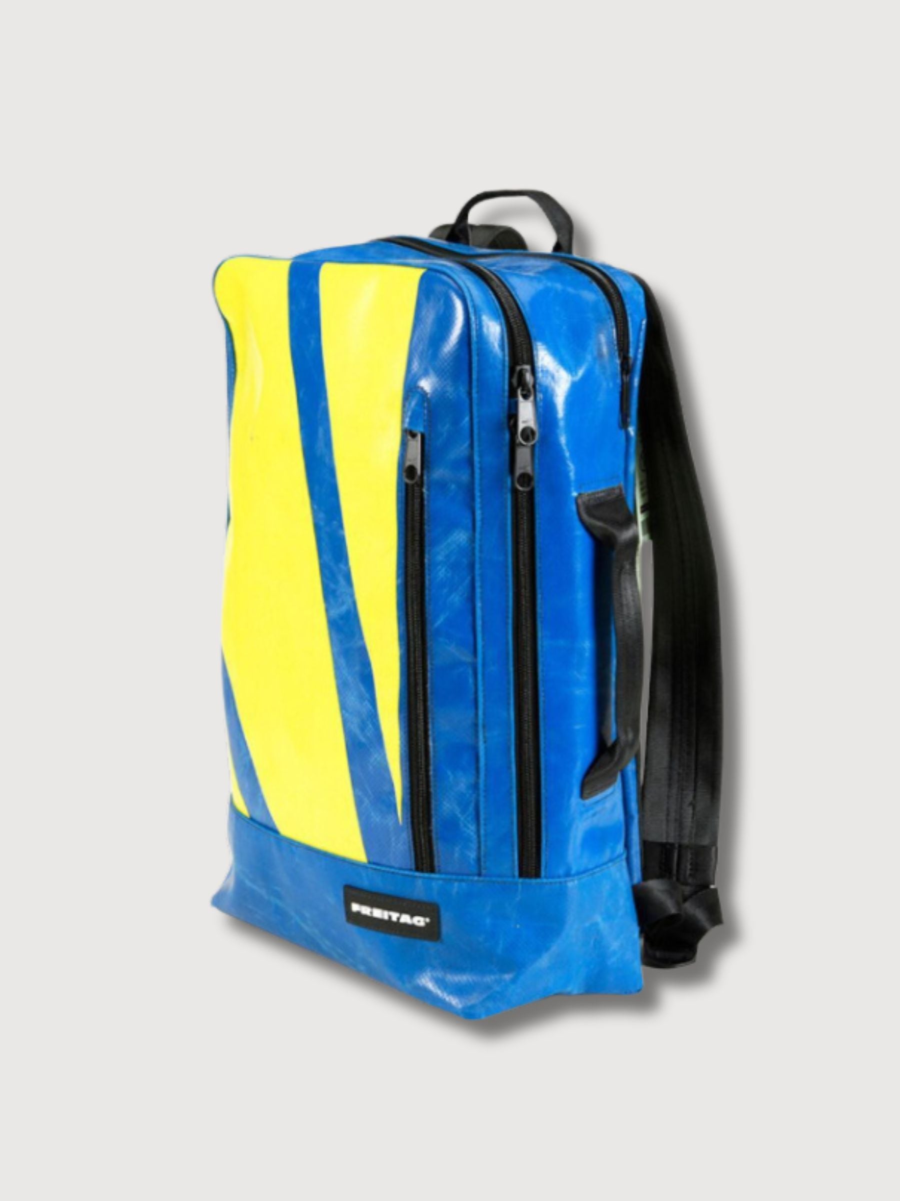 Backpack F306 Hazzardblue e passi gialli in teloni di camion usati | Freitag