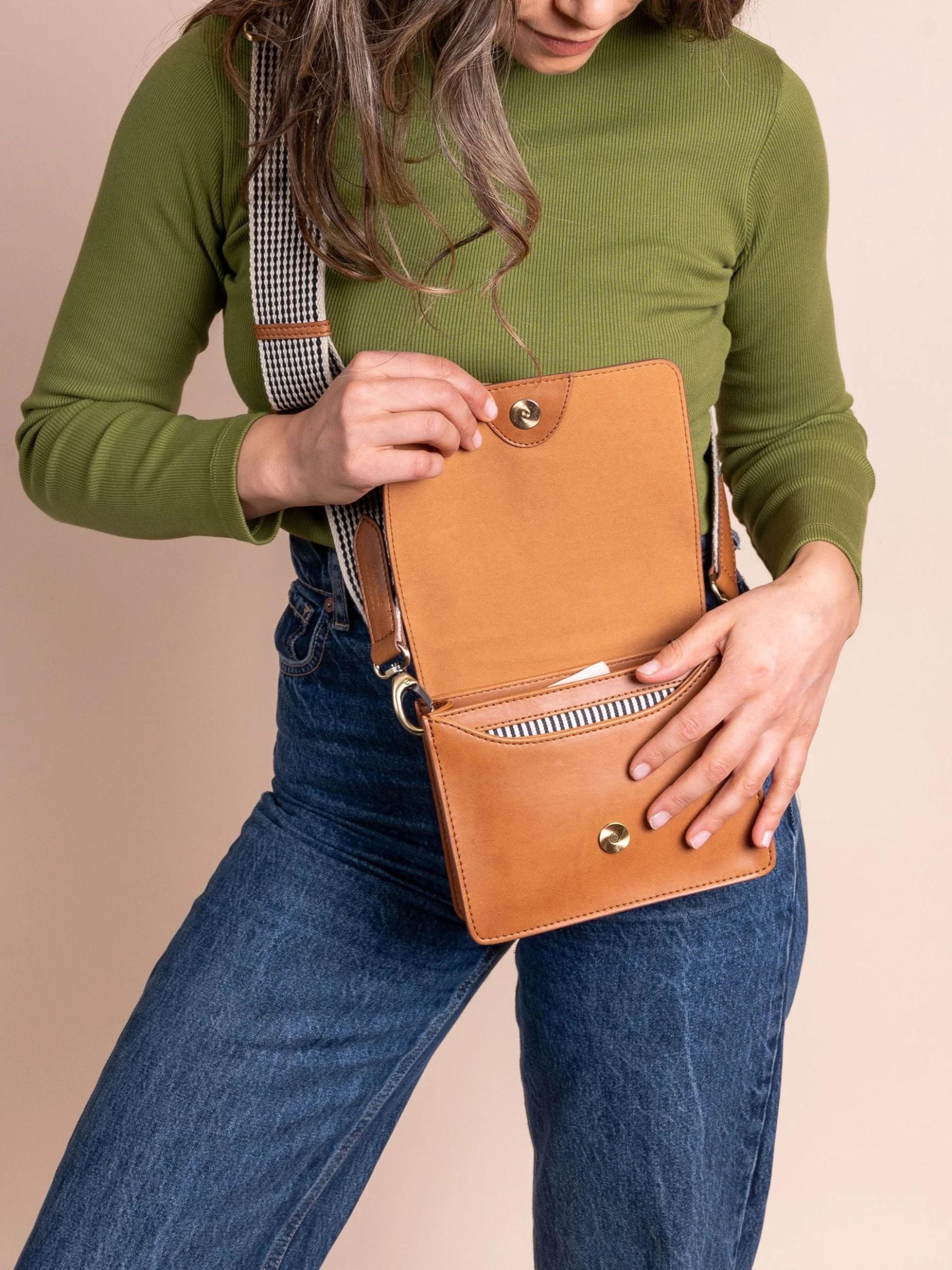 Audrey Mini Cognac Bag Appleskin by O MY BAG, small handbag with gold hardware and adjustable strap, front pocket detail.