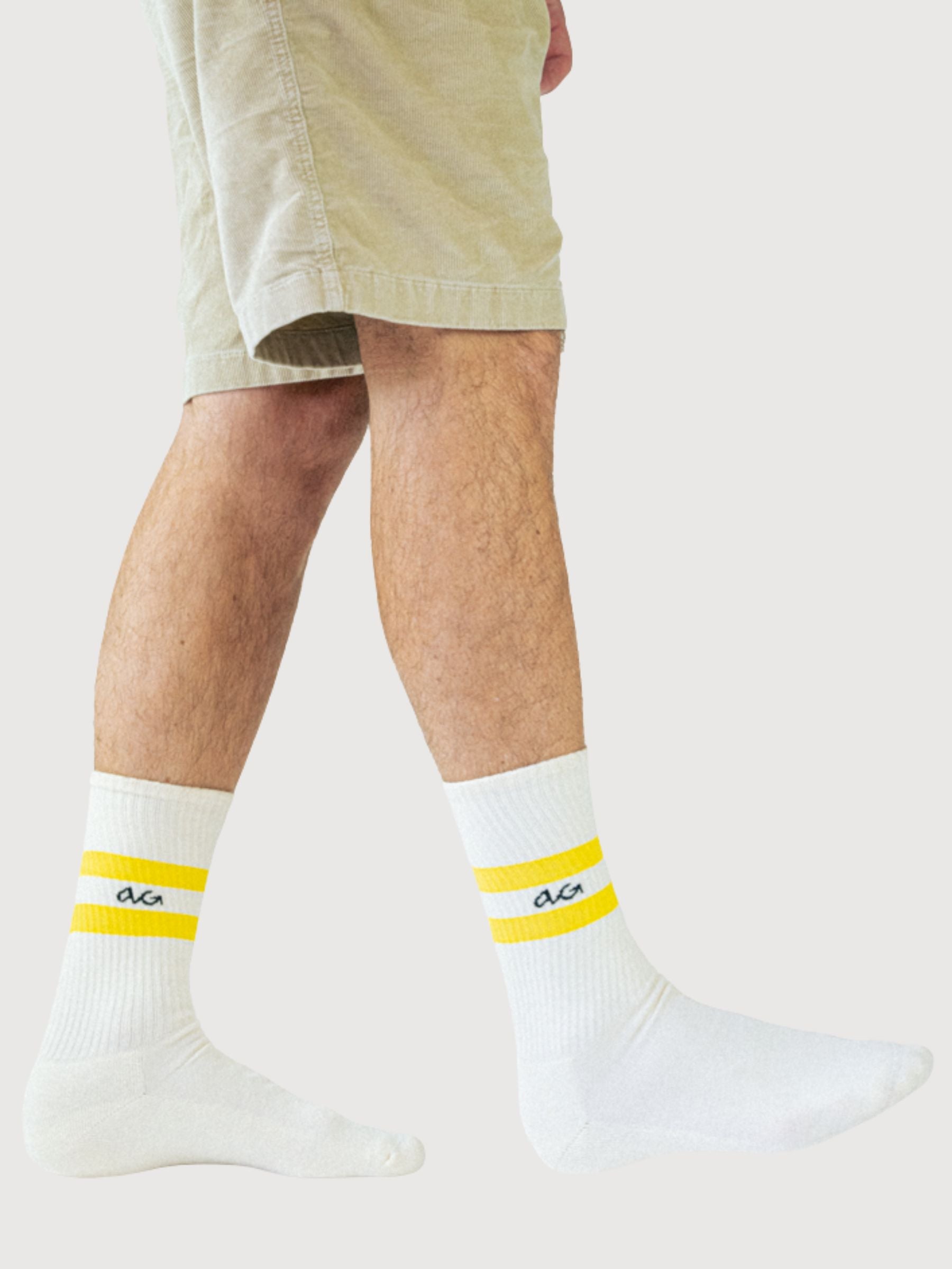 Gestreifte gelbe Unisex-Socken | Alfredo Gonzales