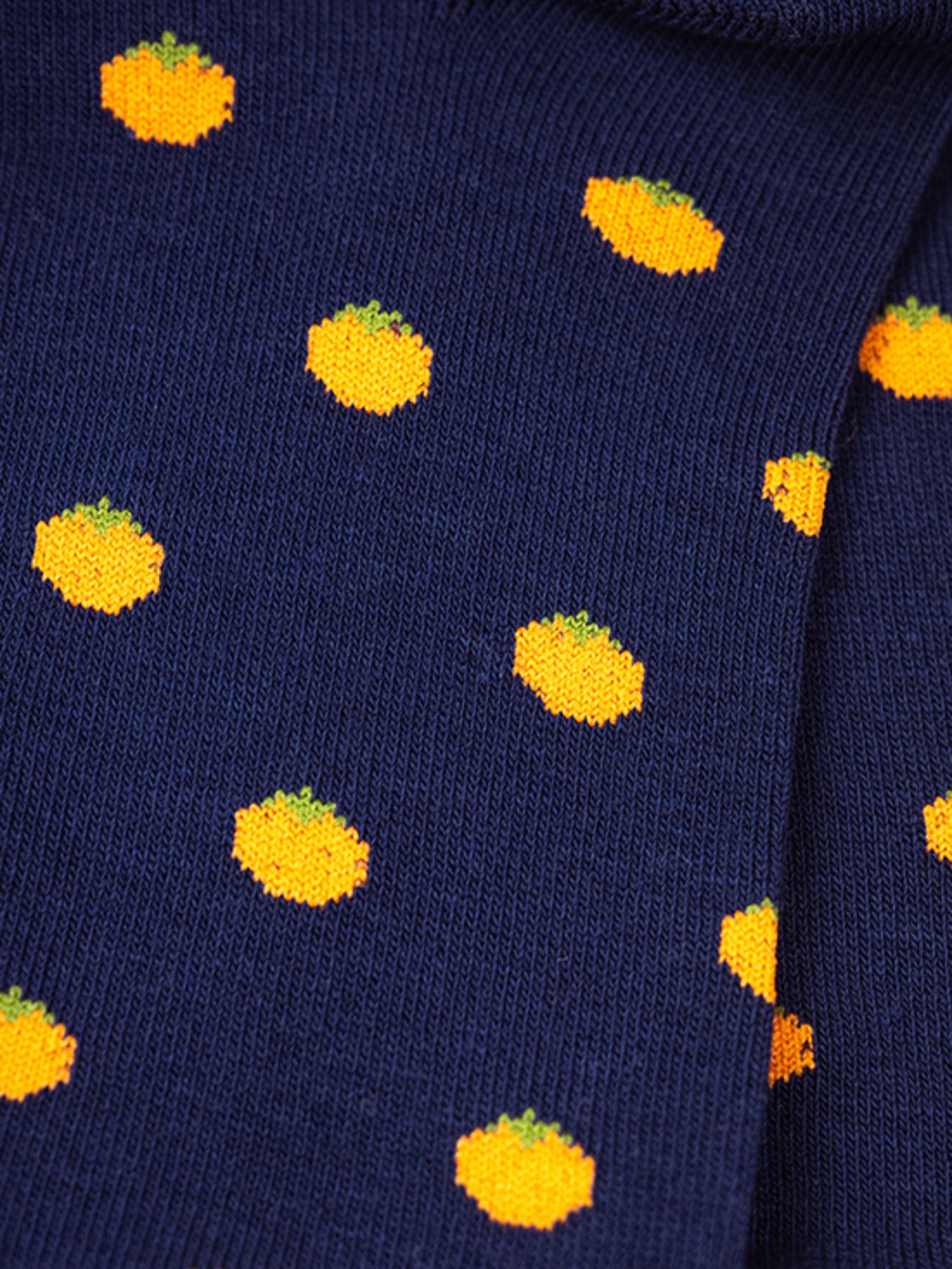 Orange Socken | Alfredo Gonzales